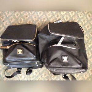 Pair of his and hers versace backpacks
